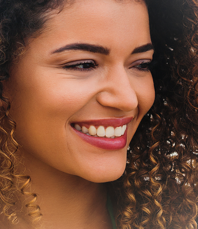 Woman with hydrated skin, showcasing the benefits of having a Profhilo treatment with Botanix Clinic.